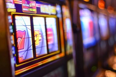 77luck live dealer table and slot game interface on mobile